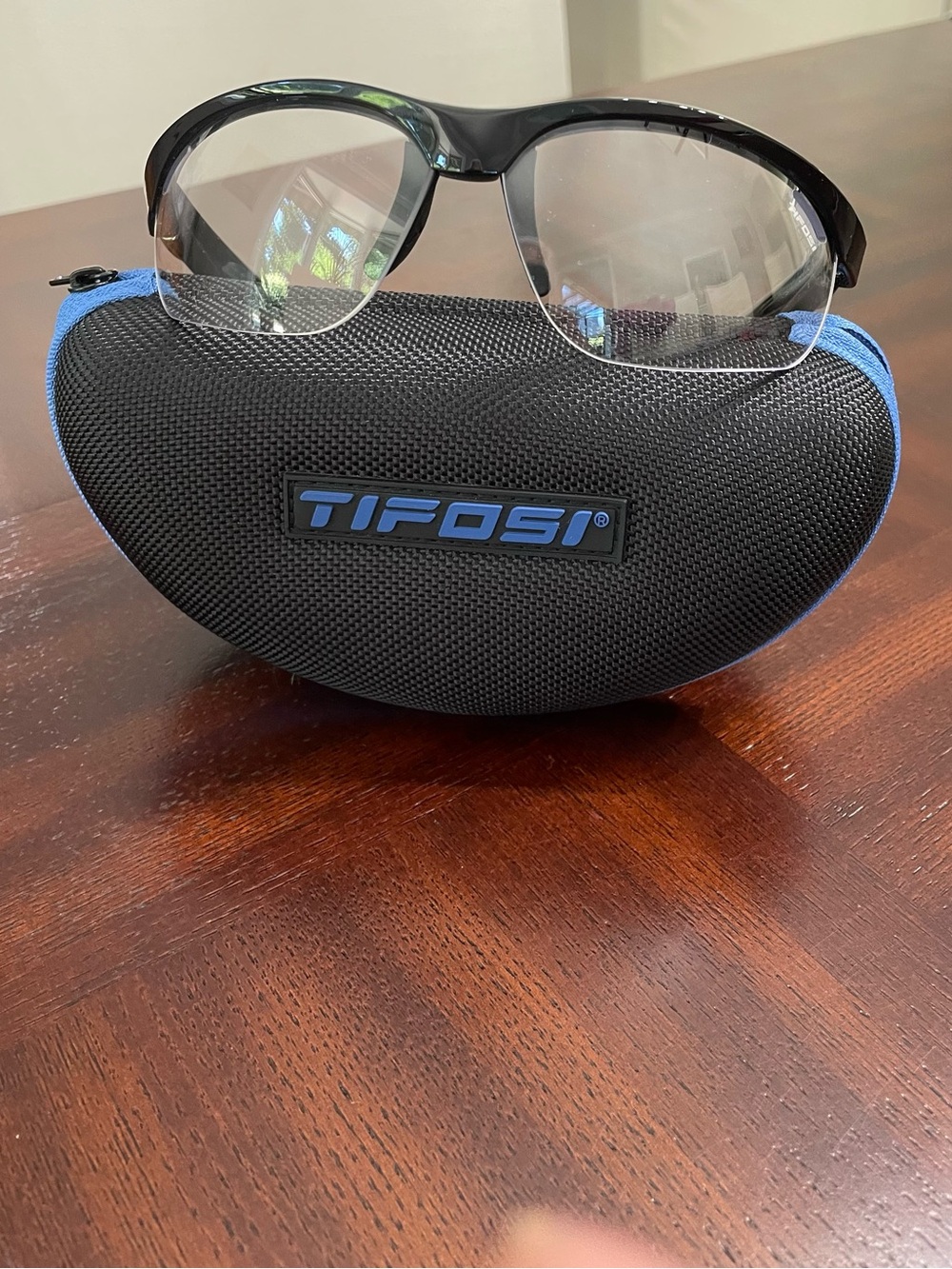 Tifosi Veloce Black Semi-Rimless sport  Eyewear with black and blue hard case